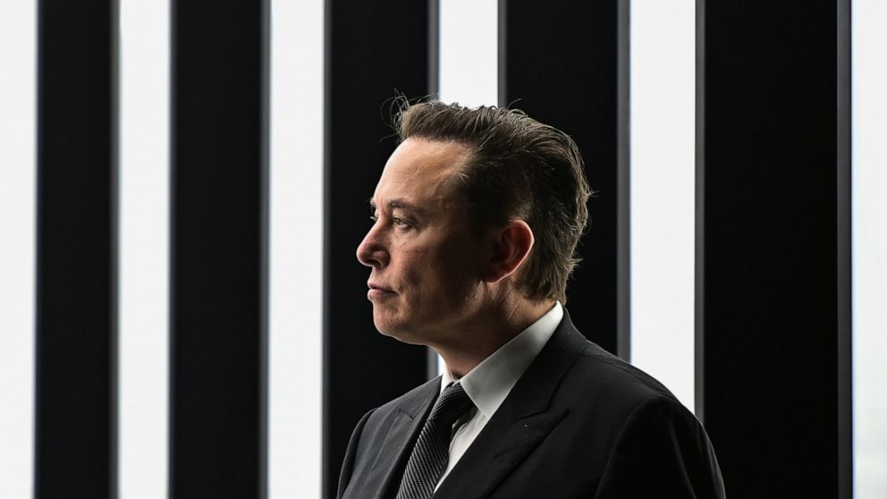 FILE - Elon Musk, Tesla CEO, attends the opening of the Tesla factory Berlin Brandenburg in Gruenheide, Germany, March 22, 2022. The intrigue surrounding Musk's Twitter investment took a new twist Tuesday, April 12, 2022, with the filing of a lawsuit