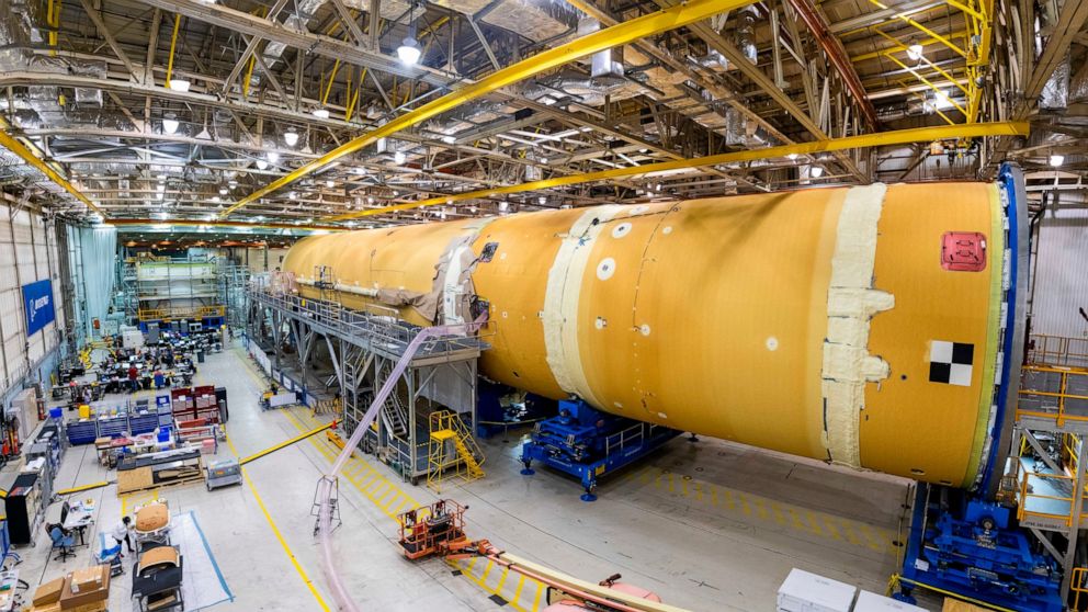 This August 2019 photo released by NASA, shows the core stage for NASA’s Space Launch System (SLS) rocket at the agency’s Michoud Assembly Facility in New Orleans. Kenneth Bowersox, acting associate administrator for human exploration, is casting dou