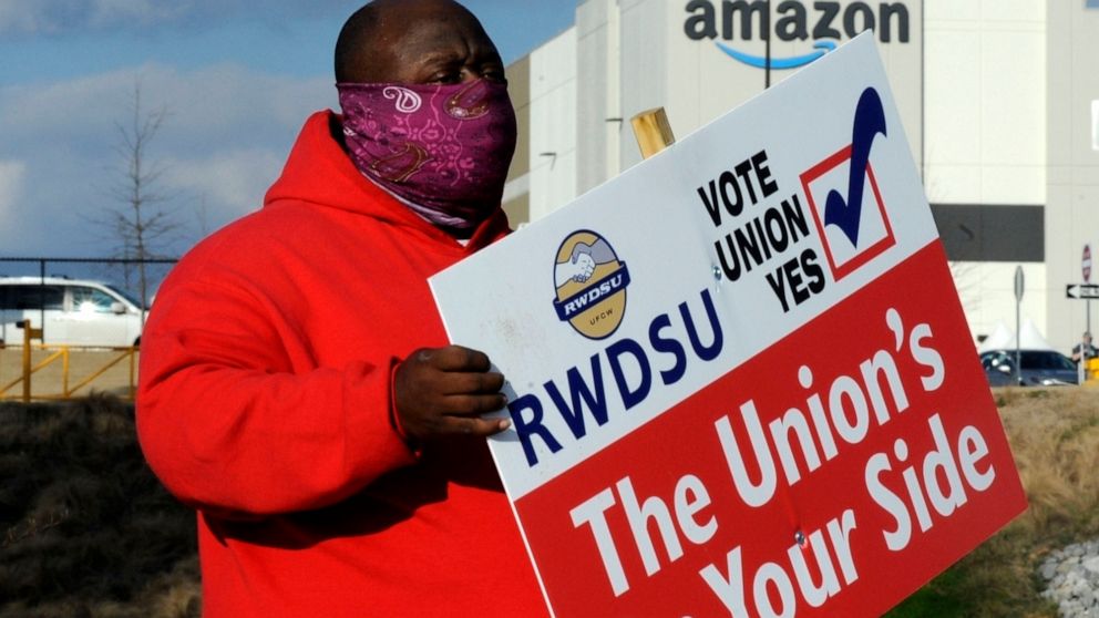‘Treating us like robots’: Amazon workers seek union