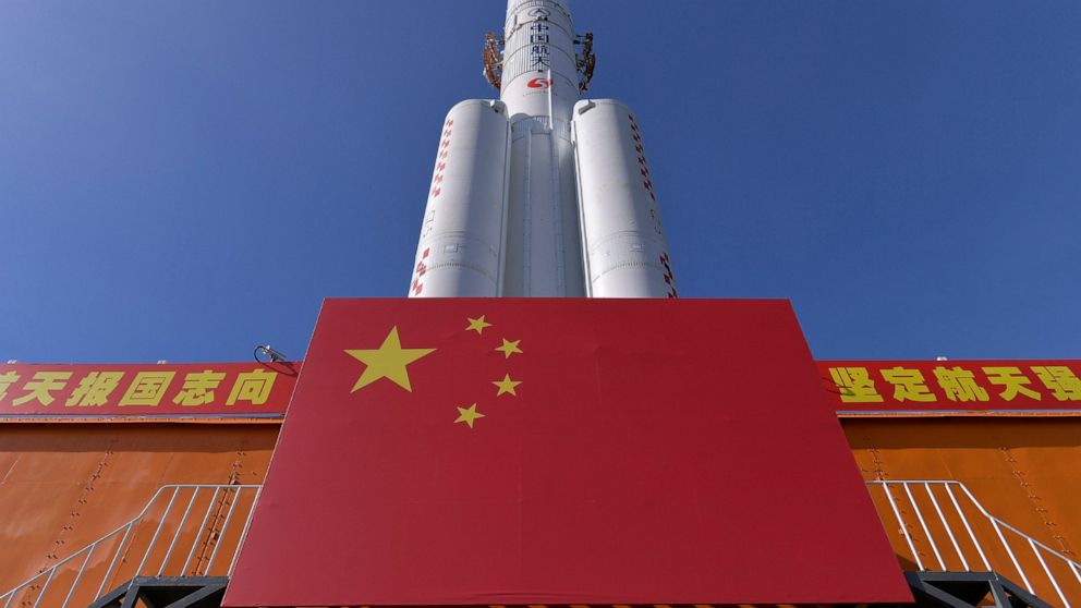 FILE - In this July 17, 2020, file photo released by China's Xinhua News Agency, a Long March-5 rocket is seen at the Wenchang Space Launch Center in south China's Hainan Province. China on Tuesday, Nov. 17, 2020, moved the massive rocket into place 