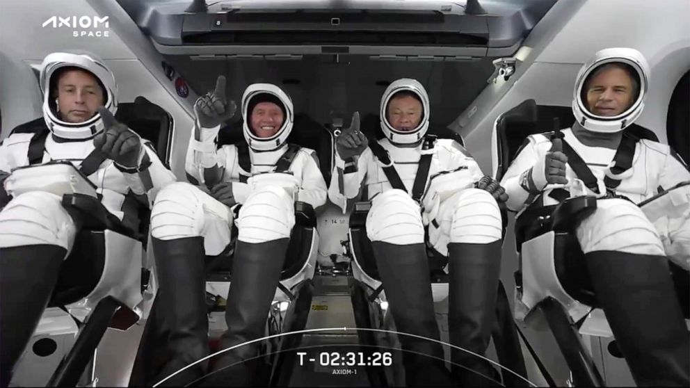HOLD FOR STORY FILE - This photo provided by SpaceX shows the SpaceX crew seated in the Dragon spacecraft on Friday, April 8, 2022, in Cape Canaveral, Fla. Axiom handled the logistics for the trip. From left are Canadian private equity CEO Mark Pathy