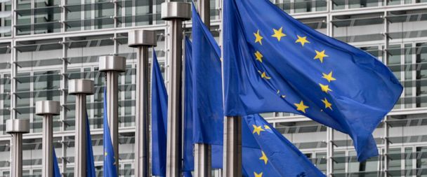 FILE - In this May 9, 2011 file photo, EU flags fly outside the European Commission headquarters in Brussels. Disinformation has evolved beyond the playbook used by Russian trolls in the U.S. election. As the European Union gears up for a crucial ele