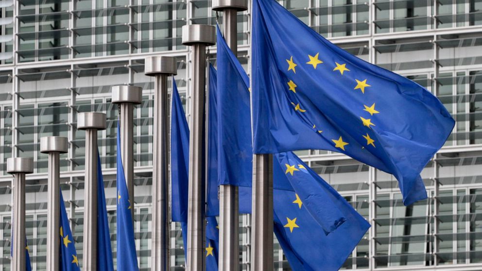 FILE - In this May 9, 2011 file photo, EU flags fly outside the European Commission headquarters in Brussels. Disinformation has evolved beyond the playbook used by Russian trolls in the U.S. election. As the European Union gears up for a crucial ele