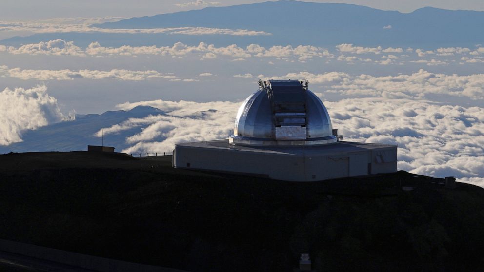 FILE - This July 14, 2019, file photo, shows a telescope at the summit of Mauna Kea, Hawaii's tallest mountain. The National Science Foundation has launched an informal outreach to Hawaii about possible funding efforts for the stalled Thirty Meter Te