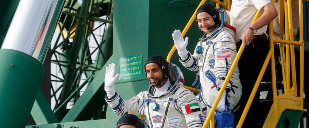 United Arab Emirates astronaut Hazza Al Mansouri, centre, Russian cosmonaut Oleg Skripochka, bottom, and U.S. astronaut Jessica Meir, top, members of the main crew to the International Space Station (ISS), board the Soyuz MS-15 spacecraft for the lau