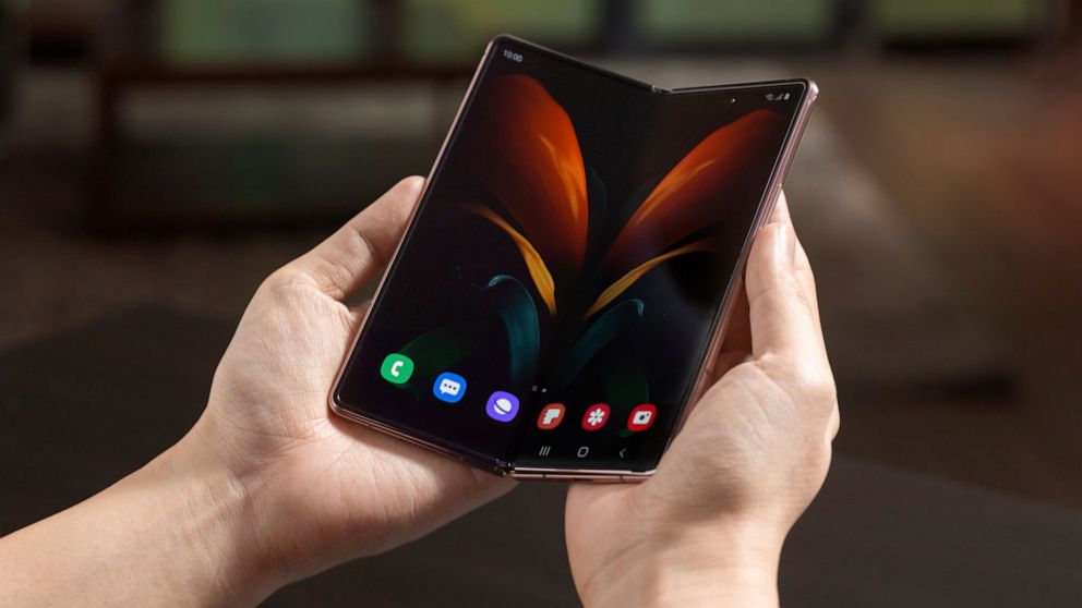 In this undated photo provided by Samsung, Samsung's foldable phone is displayed. Samsung's second attempt at a foldable smartphone will come with a $2,000 price tag and a few elite perks aimed at affluent consumers still able to afford the finer thi