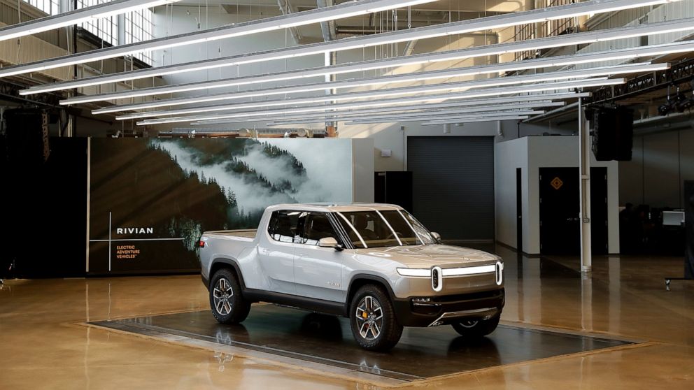 FILE - This Nov. 14, 2018 photo shows a Rivian R1T at Rivian headquarters in Plymouth, Mich. Rivian Automotive, a company that went public a day ago and hopes to produce 1,000 electric vehicles by the end of the year, will surpass General Motors to b