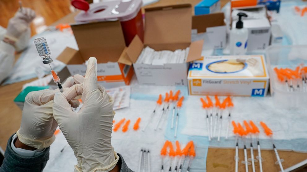 FILE - In this April 8, 2021, file photo, a Northwell Health registered nurses fills a syringe with the Johnson & Johnson COVID-19 vaccine at a pop up vaccination site at the Albanian Islamic Cultural Center in the Staten Island borough of New York. 