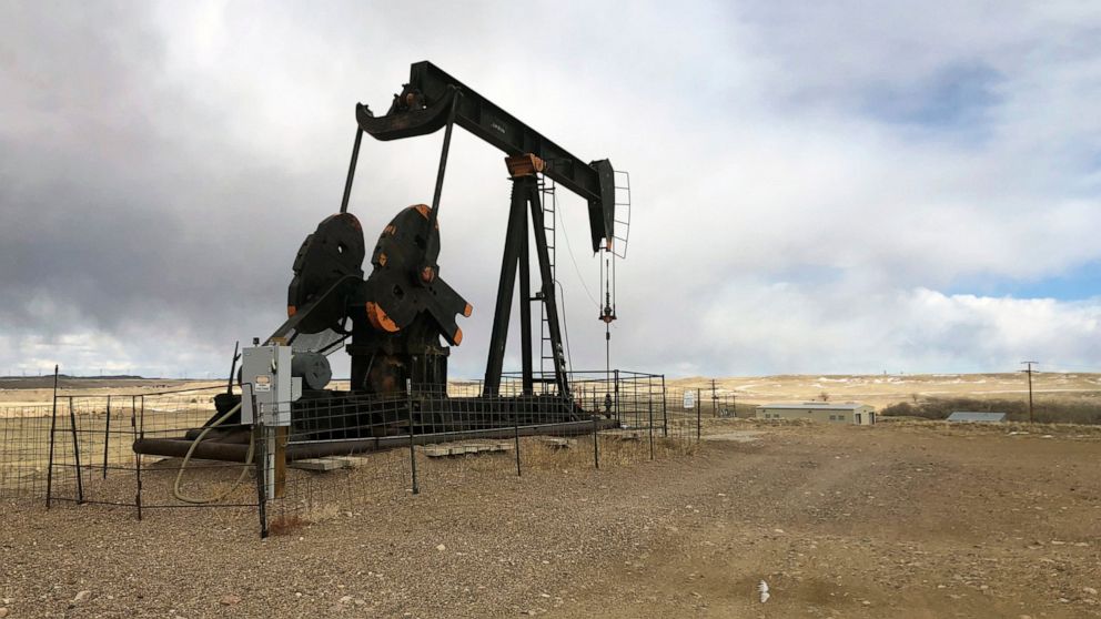 An oil well is seen east of Casper, Wyo., on Feb. 26, 2021. President Joe Biden's administration is at odds with the petroleum industry in the Rocky Mountain region and beyond for imposing a moratorium on leasing federal lands for oil and gas product