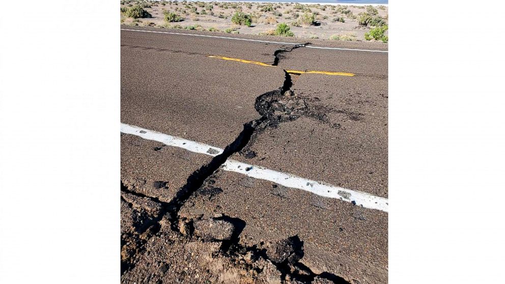 This photo provided by the Nevada Highway Patrol shows earthquake damage that has U.S. Highway 95 closed for repairs after a magnitude 6.5 earthquake struck early Friday, May 15, 2020 in a remote area west of Tonopah. Trooper Hannah DeGoey and local 