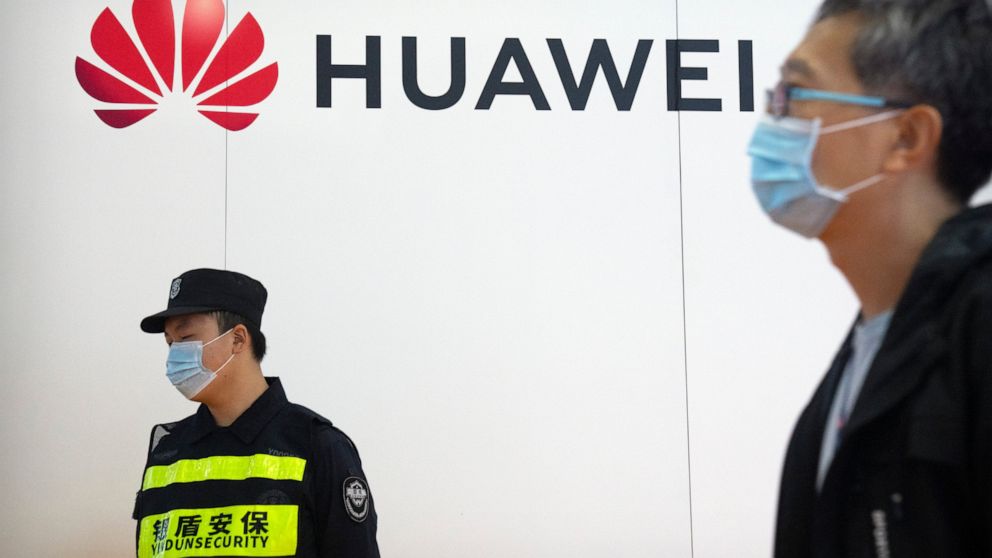 China’s Huawei says 2021 sales down, profit up