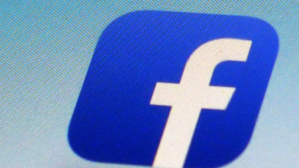 FILE - This Feb. 19, 2014, file photo, shows a Facebook app icon on a smartphone in New York. The Australian government said on Friday, July 31, 2020 it plans to give Google and Facebook three months to negotiate with Australian media businesses fair