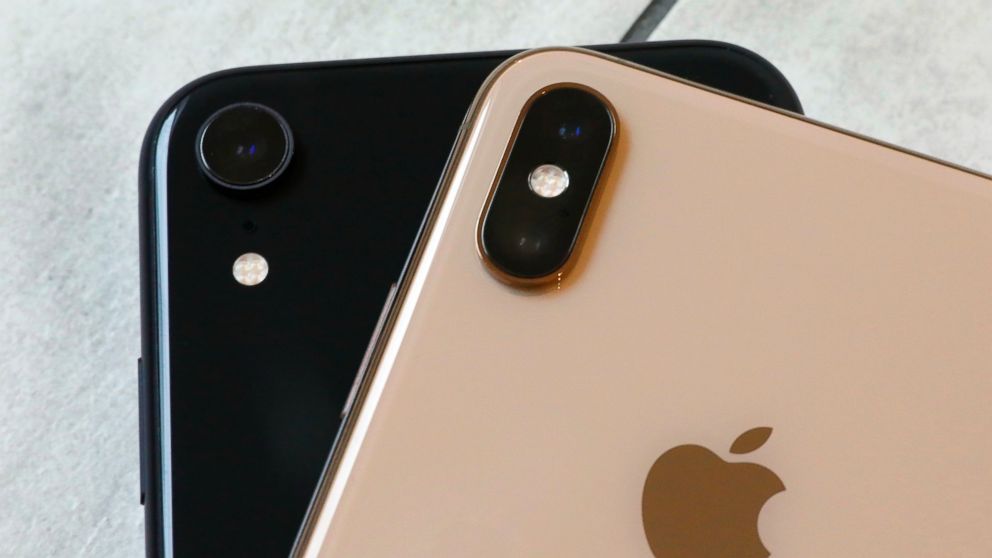 FILE- This Oct. 22, 2018, file photo shows the iPhone XR, left, that has a single lens, and the iPhone XS Max that has two lenses, in New York. Wall Street expects that Apple's latest quarterly snapshot will show mixed results. Financial analysts pre
