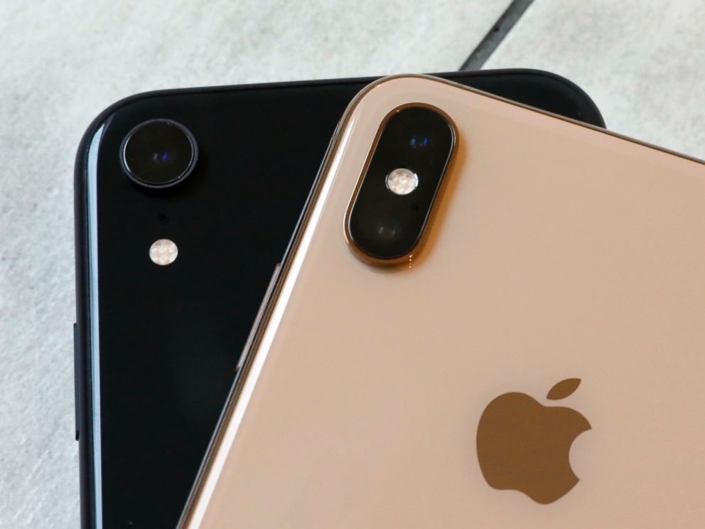 FILE- This Oct. 22, 2018, file photo shows the iPhone XR, left, that has a single lens, and the iPhone XS Max that has two lenses, in New York. Wall Street expects that Apples latest quarterly snapshot will show mixed results. Financial analysts pre