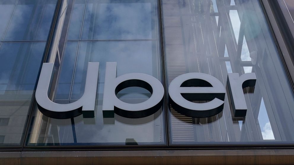FILE - An Uber sign is displayed at the company's headquarters in San Francisco, Monday, Sept. 12, 2022. Uber said Thursday, Sept. 15, that it reached out to law enforcement after a hacker apparently breached its network. A security engineer said the