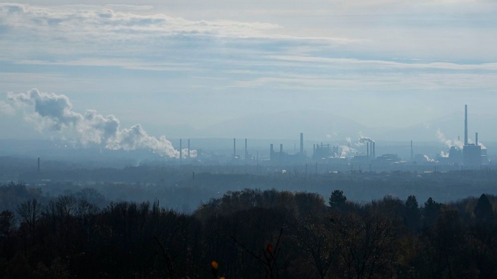 Smoke rises form chimneys of a steel plant in Ostrava, Czech Republic, Friday, Nov. 11, 2022. High energy prices linked to Russia's war in Ukraine have paved the way for coal’s comeback, endangering climate goals and threatening health from increased