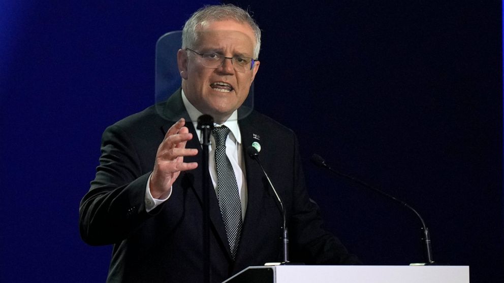 Australian Prime Minister Scott Morrison gestures as he makes a statement at the COP26 U.N. Climate Summit in Glasgow, Scotland, Monday, Nov. 1, 2021. The U.N. climate summit in Glasgow gathers leaders from around the world, in Scotland's biggest cit