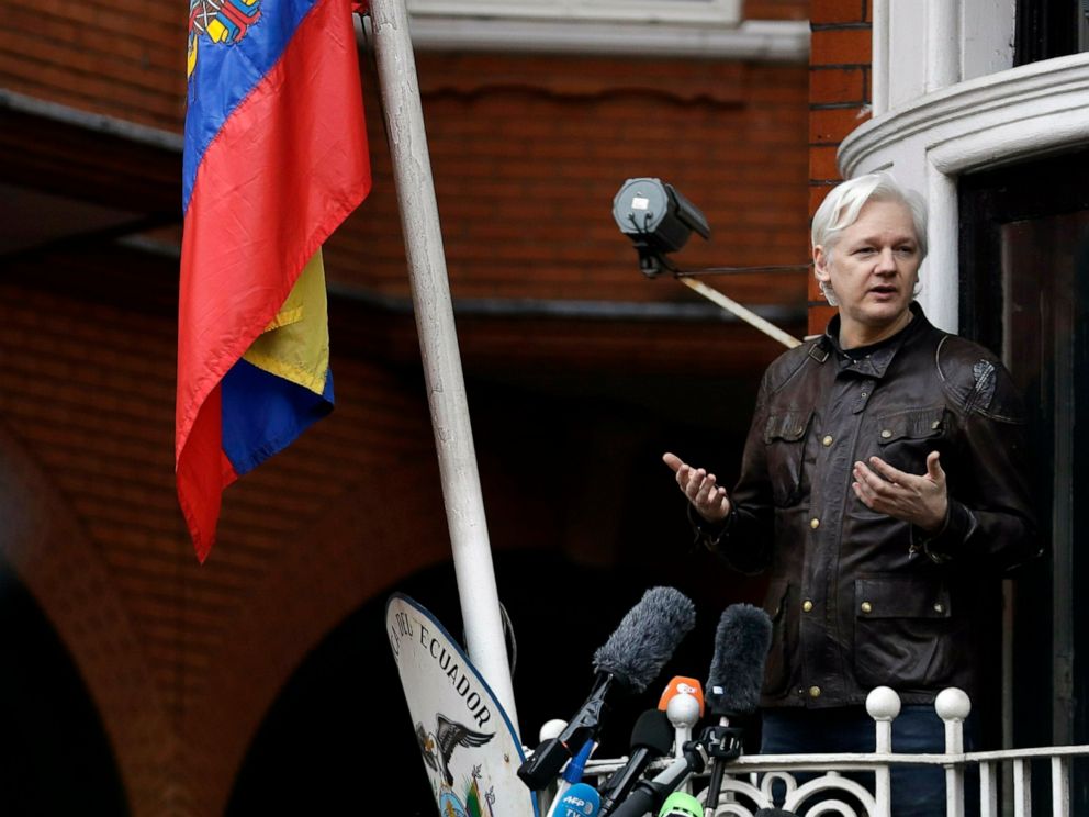 FILE - In this Friday May 19, 2017 file photo, WikiLeaks founder Julian Assange gestures as he speaks on the balcony of the Ecuadorian embassy, in London. A senior Ecuadorian official said no decision has been made to expel Julian Assange from the co