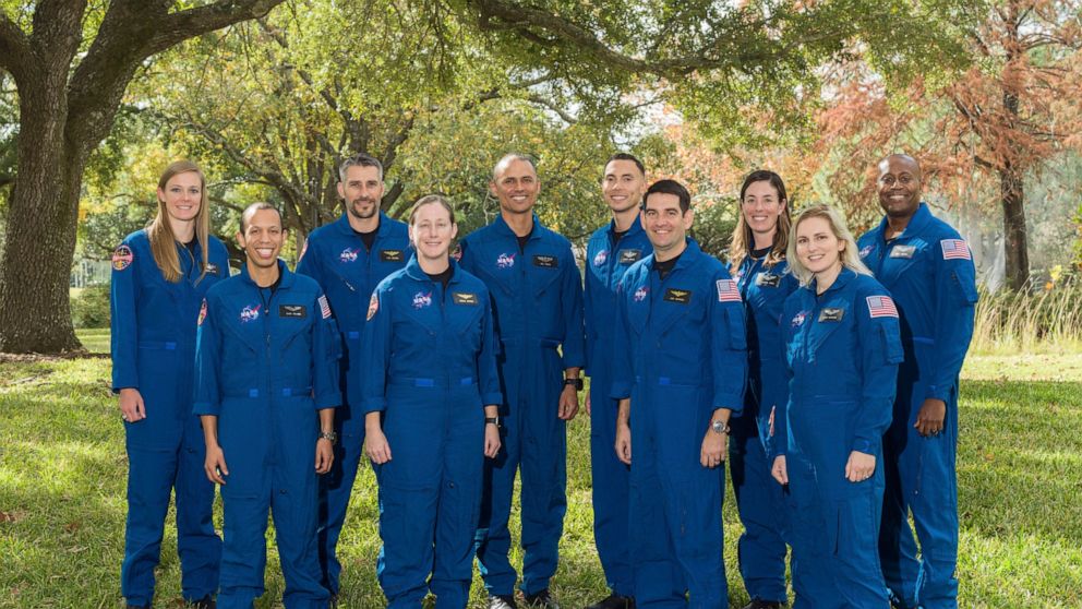 This photo provided by NASA shows its 2021 astronaut candidate class, announced on Monday, Dec. 6, 2021. The 10 candidates stand for a photo at the Johnson Space Center in Houston on Dec. 3, 2021. From left are U.S. Air Force Maj. Nichole Ayers, Chri