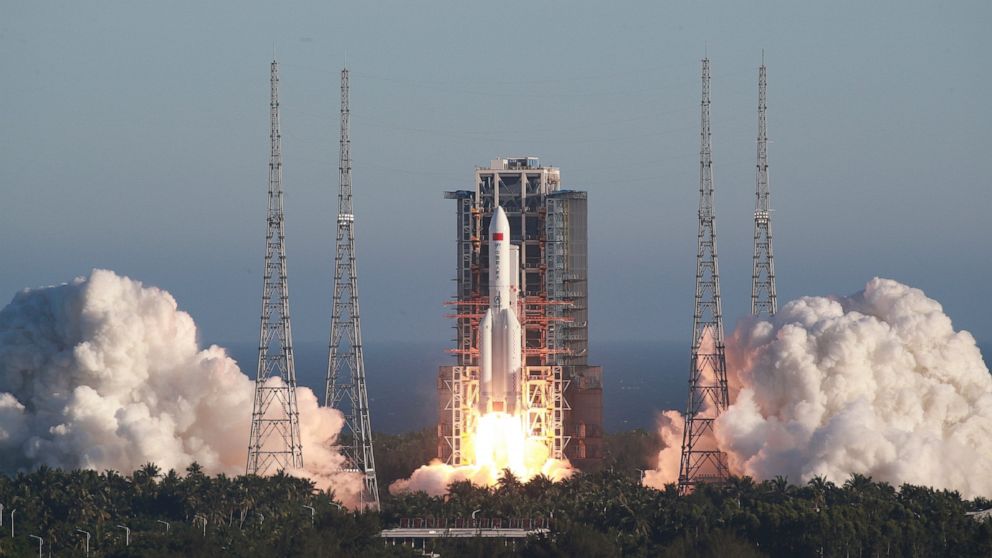 In this photo released by Xinhua News Agency, China's new large carrier rocket Long March-5B blasts off from the Wenchang Space Launch Center in southern China's Hainan Province, May 5, 2020. The Long March-5B made its maiden flight on Tuesday, sendi