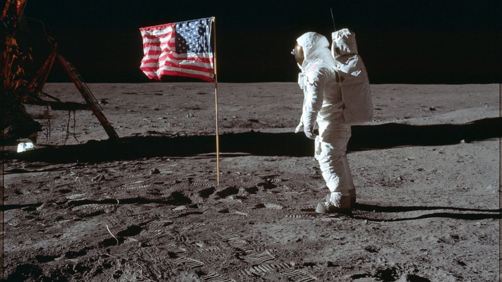 FILE - In this July 20, 1969 photo made available by NASA, astronaut Buzz Aldrin Jr. poses for a photograph beside the U.S. flag on the moon during the Apollo 11 mission. Aldrin and fellow astronaut Neil Armstrong were the first men to walk on the lu