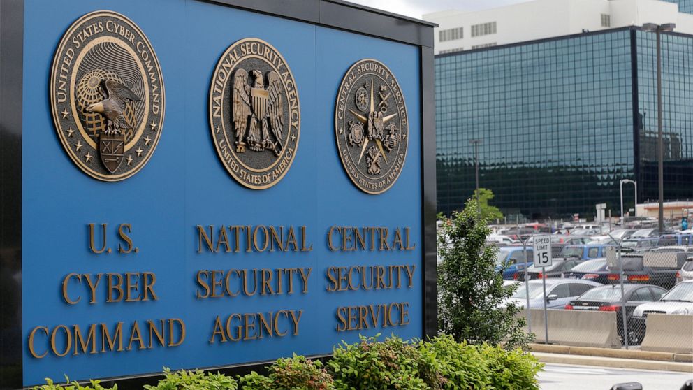 FILE - In this June 6, 2013 file photo, the sign outside the National Security Administration (NSA) campus in Fort Meade, Md. A high-profile raid at the home of an NSA contractor seemed to be linked to the devastating leak of U.S. government hacking 