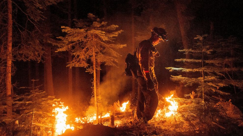 California wildfire flares but within line crews have built