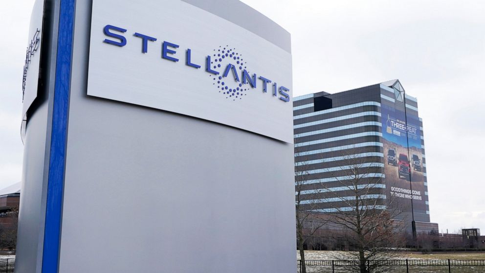 FILE - A Stellantis sign stands outside the Chrysler Technology Center in Auburn Hills, Mich., Jan. 19, 2021. Stellantis is teaming with Archer Aviation to create an electric aircraft. Stellantis will provide its advanced manufacturing technology and