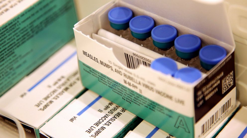 FILE- In this March 27, 2019, file photo, measles, mumps and rubella vaccines sit in a cooler at the Rockland County Health Department in Pomona, N.Y. In social media’s battle against misinformation, bogus claims about the dangers of vaccines are the