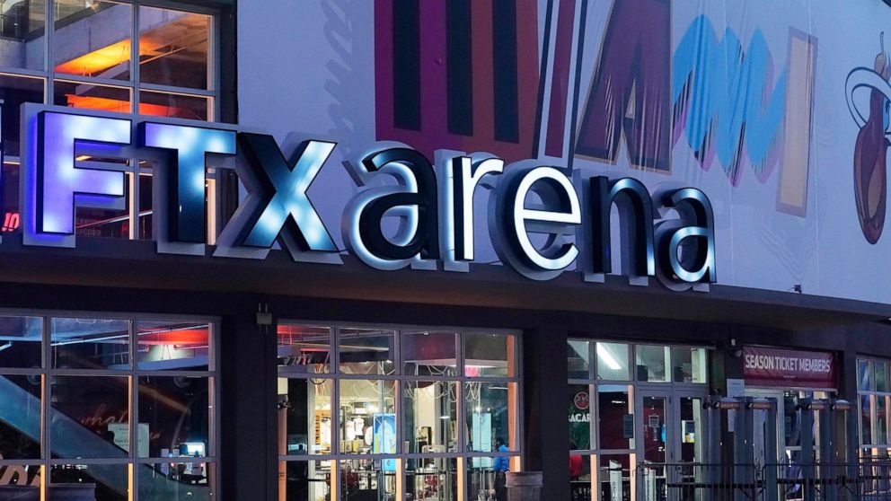Signage for the FTX Arena, where the Miami Heat basketball team plays, is illuminated Saturday, Nov. 12, 2022, in Miami. Collapsed cryptocurrency trading firm FTX confirmed there was “unauthorized access” to its accounts, hours after the company file