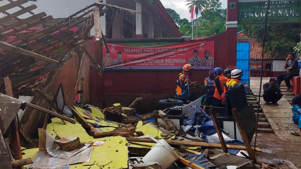 A strong earthquake collapses houses in Java, Indonesia.  56 dead