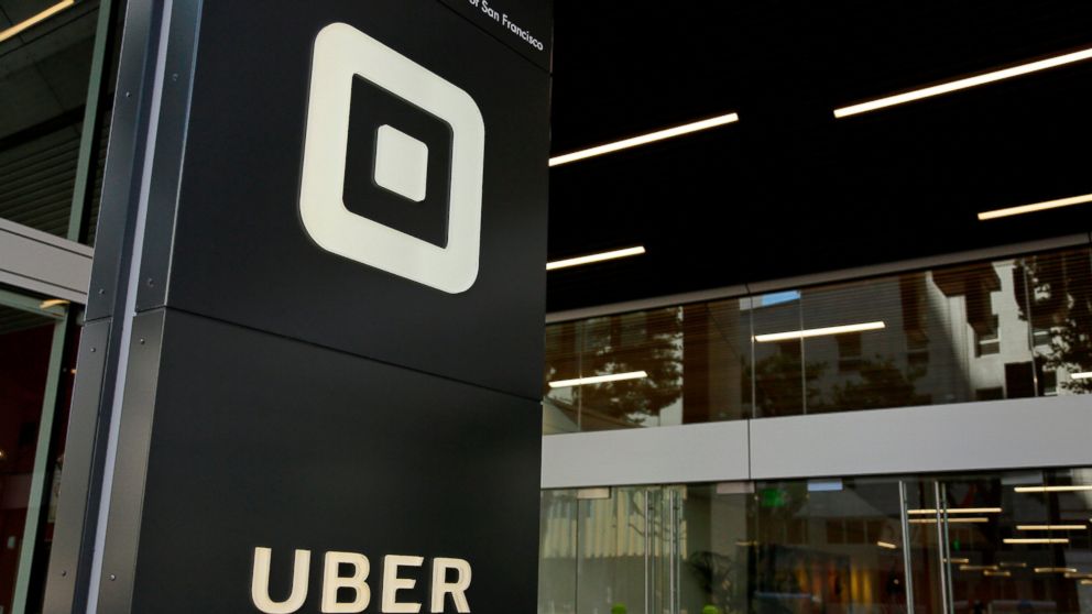 FILE - This June 21, 2017, file photo shows the building that houses the headquarters of Uber, in San Francisco. Police in Barcelona have arrested seven people on suspicion of attacking cars that work with ride-hailing apps like Uber and Cabify as pa