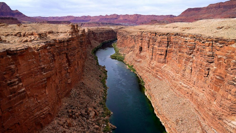 FILE - The Colorado River in the upper River Basin is pictured in Lees Ferry, Ariz., on May 29, 2021. A Native American tribe has agreed to lease more of its water to help address dwindling supplies in the Colorado River Basin. The agreement involves