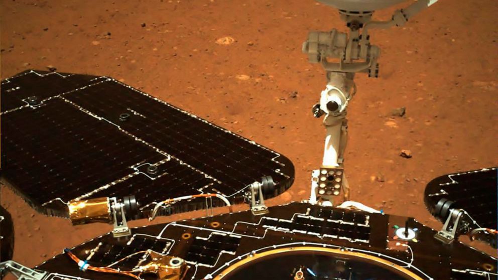 China’s Mars rover touches ground on red planet