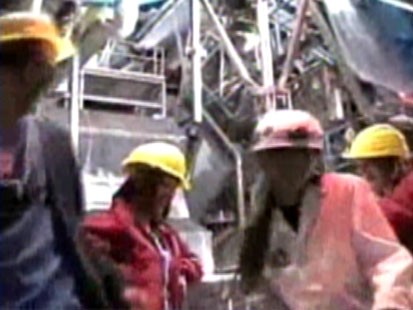 Picture of people in hard hats.