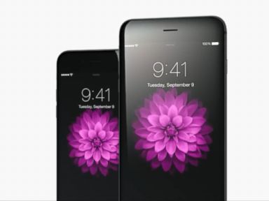 VIDEO: The company says that the latest models have broken all iPhone pre-order sales records.