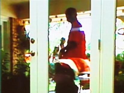 VIDEO: A Texas man views his home being burglarized while vacationing in Connecticut.