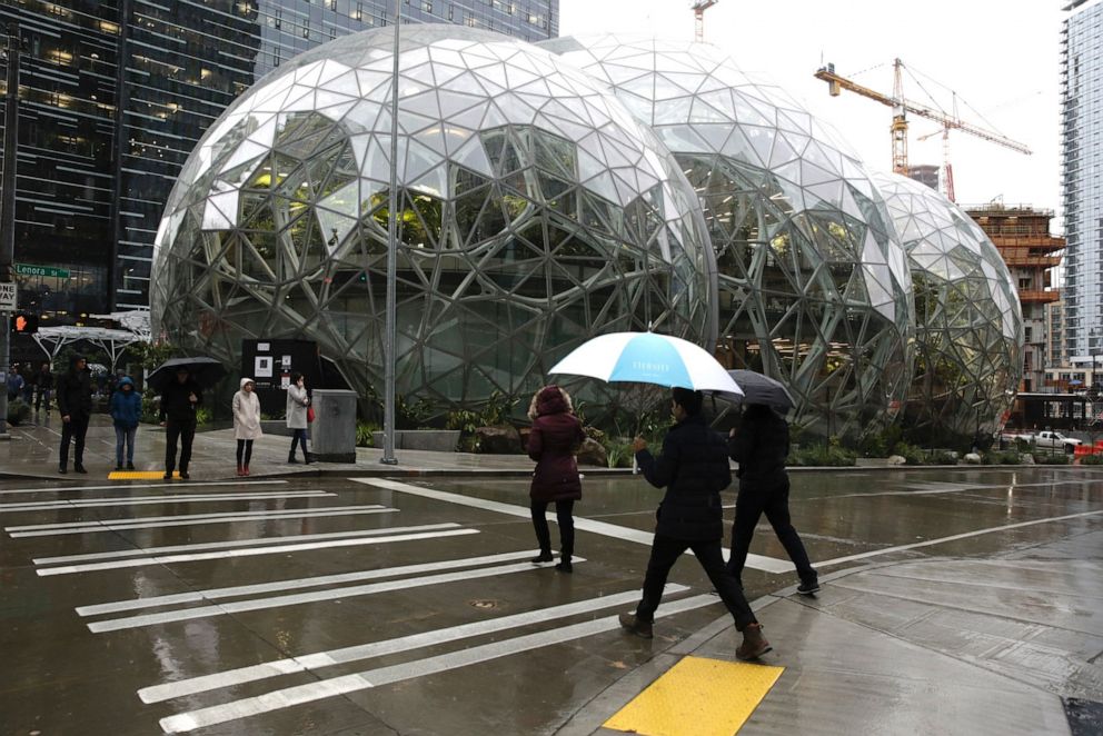 PHOTO: People walk past the Amazon Spheres, in Seattle, on Jan. 29, 2018l.