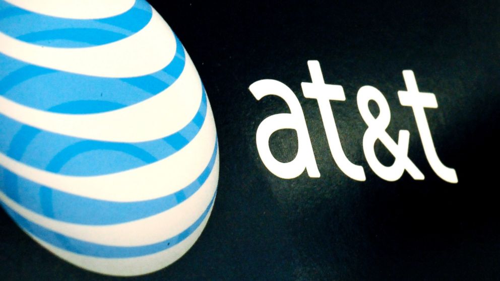 PHOTO: In this Oct. 19, 2009 file photo, the AT&T logo is on display at a RadioShack store in Gloucester, Mass. On April 21, 2014, AT&T said that it plans a major expansion of super-fast Internet services to cover as many as 100 municipalities.