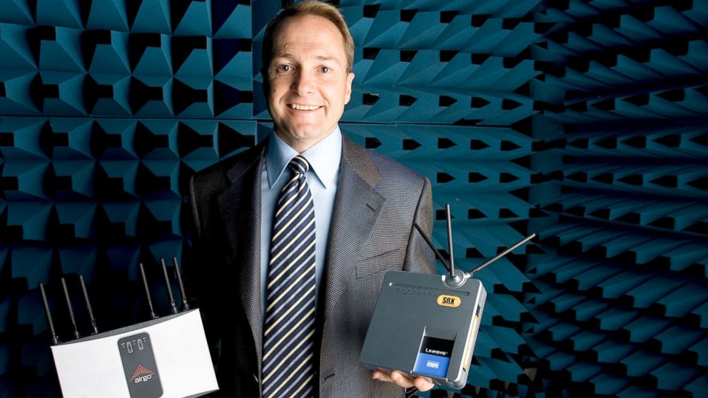 Greg Raleigh, founder of Airgo Networks, is seen in this May 2005 file photo holding two wireless routers in a testing chamber at the Airgo Networks offices in Palo Alto, Calif. 