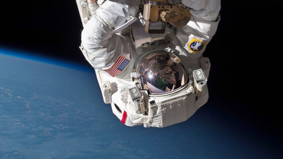 Astronaut Chris Cassidy performs a space walk on the International Space Station in this May 11, 2013 NASA file photo. 