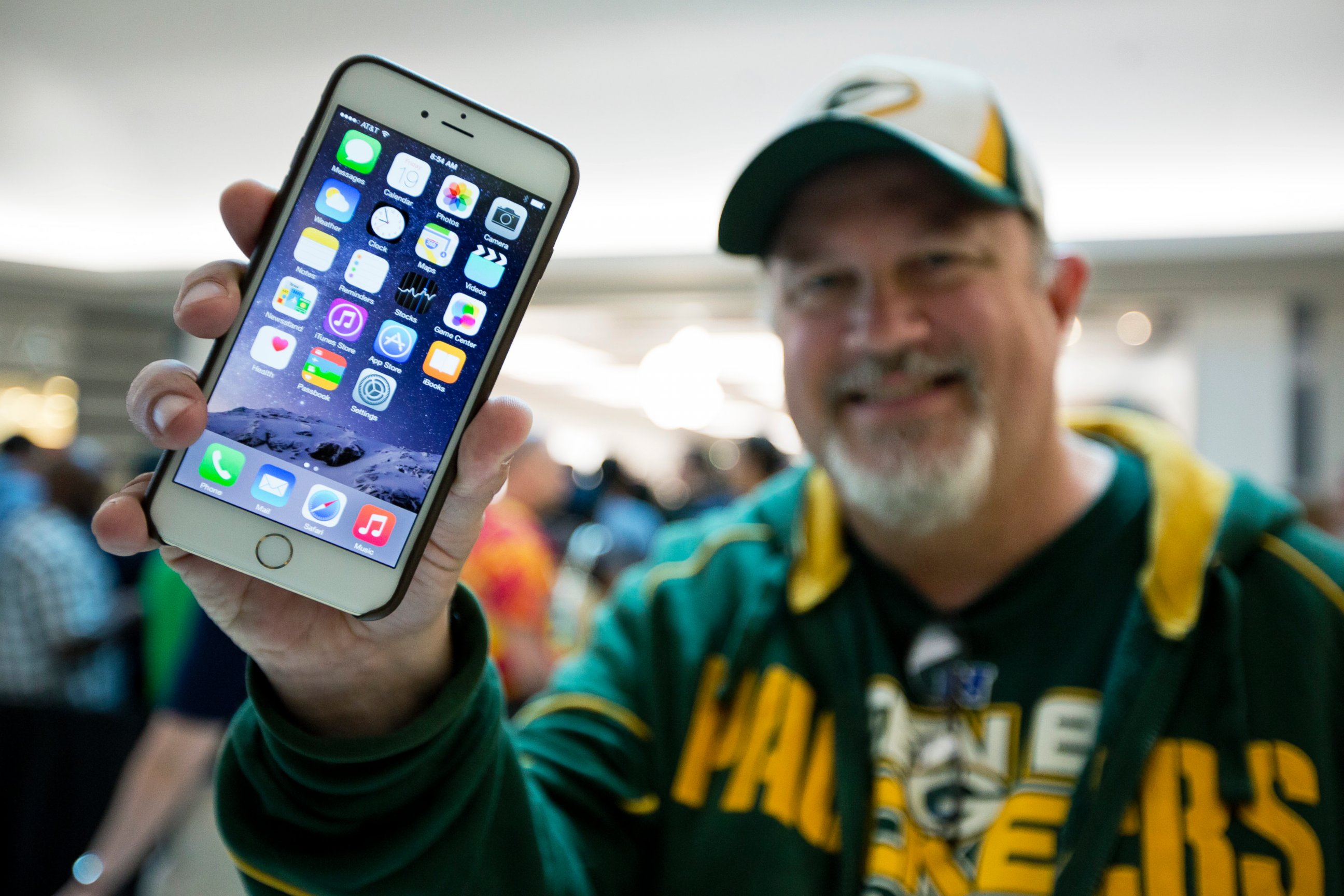 PHOTO: In this Sept. 19, 2014 file photo, John Mihalkovic shows off his newly purchased iPhone 6 Plus outside the Apple store at Lynnhaven Mall in Virginia Beach, Va.