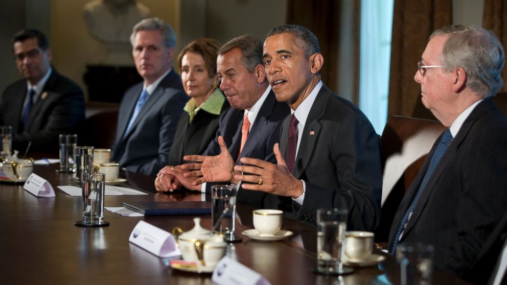 President Barack Obama, joined by from left, Rep. Xavier Becerra, D-Calif., House Majority Leader Kevin McCarthy of Calif., House Minority Leader Nancy Pelosi of Calif., House Speaker John Boehner of Ohio, and Senate Majority Leader Mitch McConnell of Ky., speaks to the media before his meeting with bipartisan, bicameral leadership of Congress to discuss a wide range of issues, including cybersecurity, on Jan. 13, 2015, at the White House in Washington. 