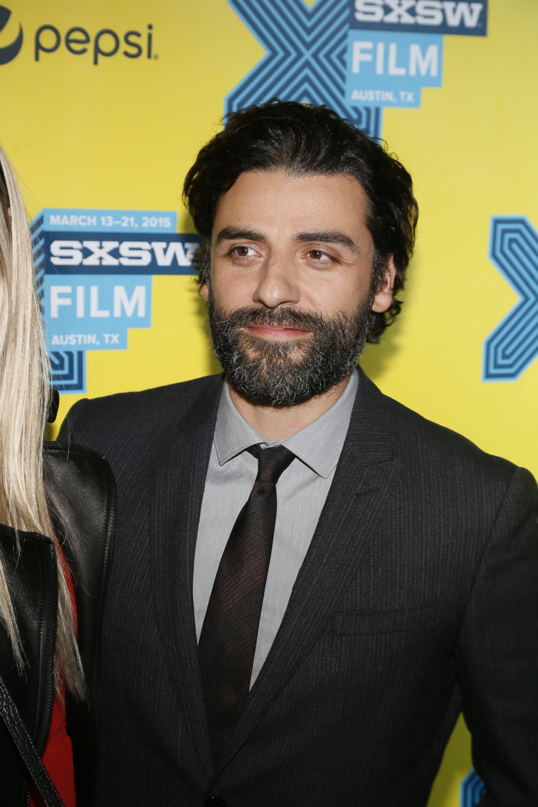 PHOTO: Oscar Isaac walks the red carpet for "Ex Machina" during the South by Southwest Film Festival on March 14, 2015 in Austin, Texas.