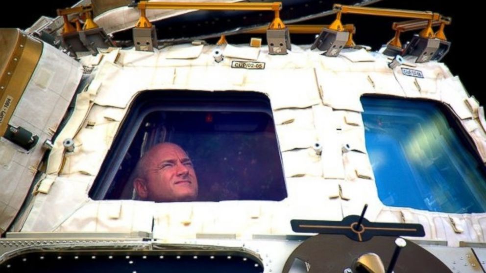 PHOTO: In this undated photo provided by NASA on March 1, 2016, astronaut Scott Kelly looks out the cupola of the International Space Station. 