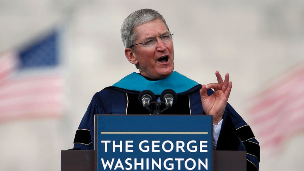 Apple CEO Tim Cook addresses graduates during George Washington University's commencement exercises on the National Mall, May 17, 2015 in Washington.