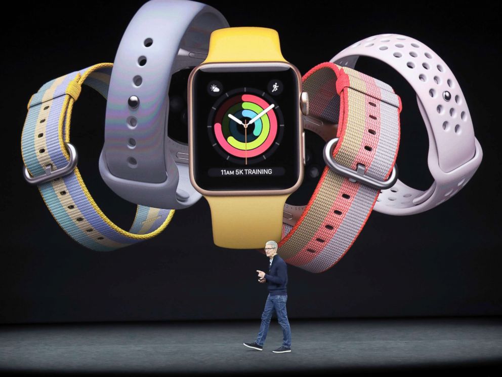 PHOTO: Apple CEO Tim Cook shows new products at the Steve Jobs Theater on the new Apple campus, Sept. 12, 2017, in Cupertino, Calif.