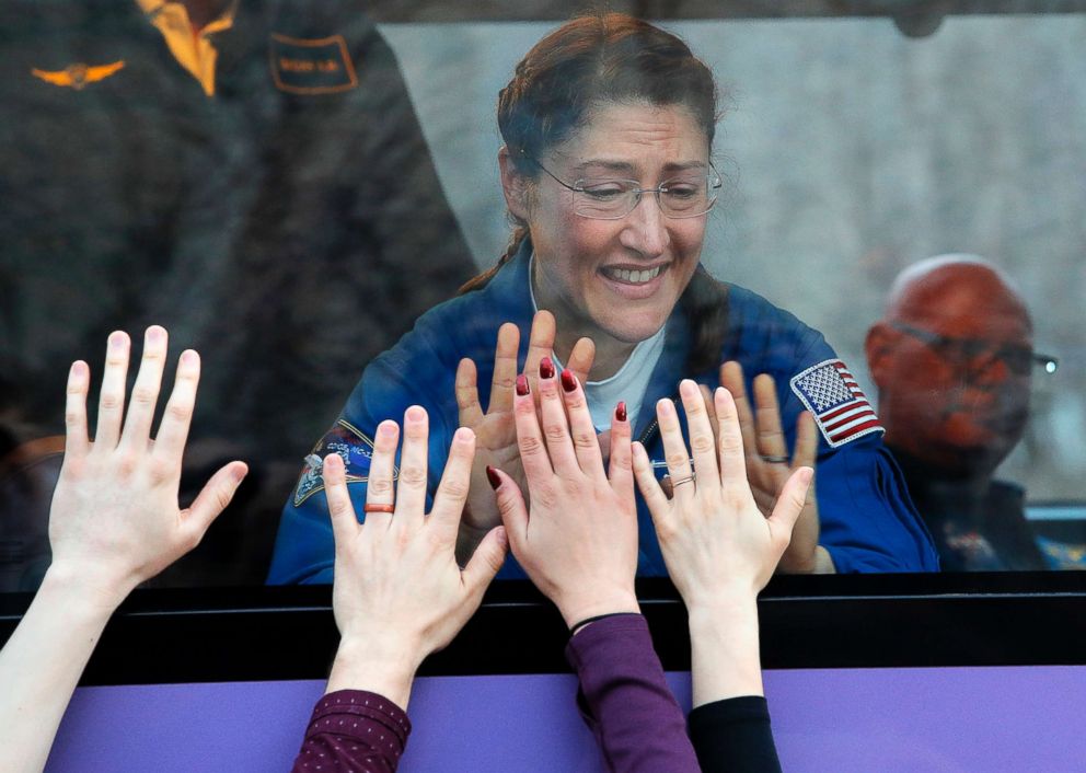 PHOTO: American astronaut Christina Hammock Koch, a members of the main crew to the International Space Station (ISS), says goodbye to relatives from a bus prior to the launch of the Soyuz FG rocket at the Baikonur cosmodrome, Kazakhstan, March 13, 2019.