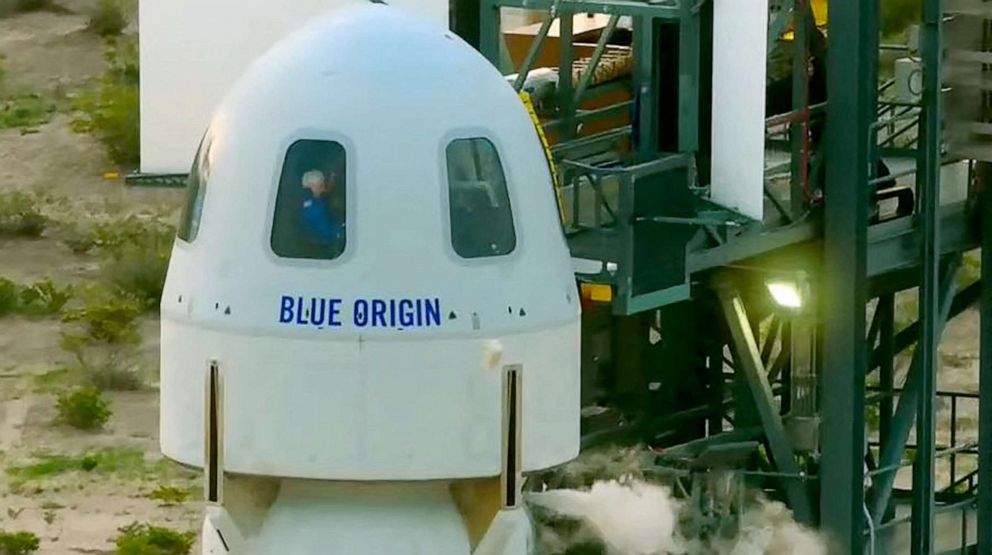 PHOTO: Jeff Bezos, Wally Funk (in window) and Oliver Daemen before they travel to the launch pad for the first crewed flight of Blue Origin's reusable New Shepard craft, July 20, 2021, in Van Horn, Texas. 