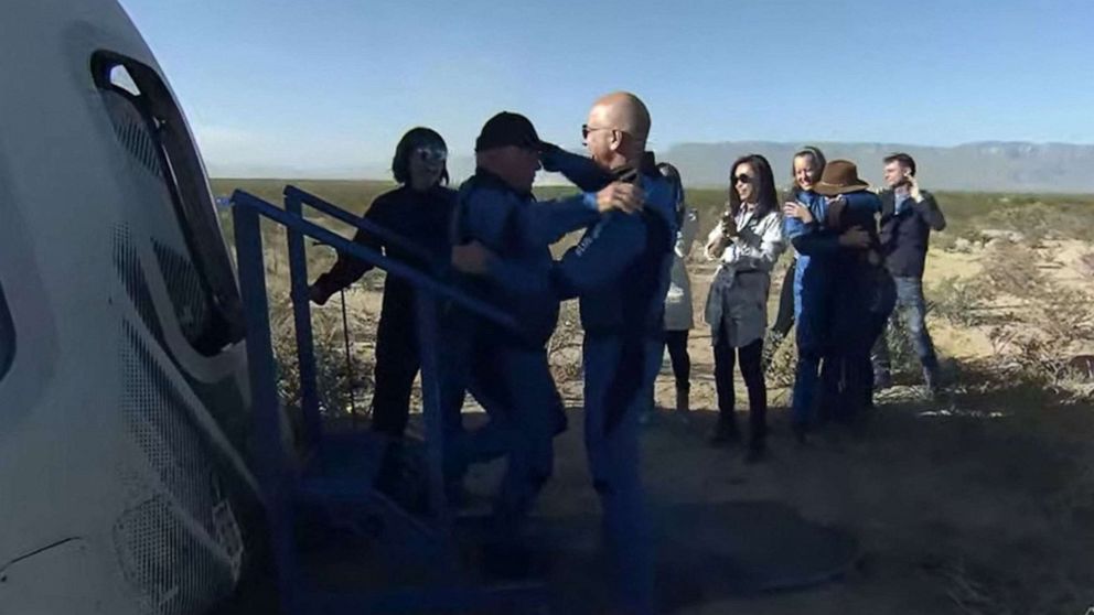 PHOTO: New Shepard NS-18 mission crew member "Star Trek" actor, William Shatner gets a hug from Blue Origin founder Jeff Bezos on Oct. 13, 2021, after landing in the West Texas region, 25 miles north of Van Horn. 